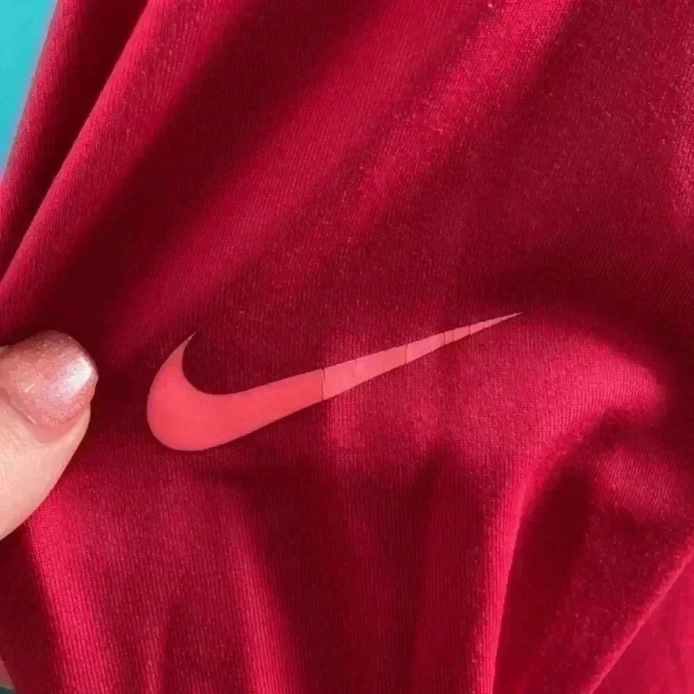 Nike pro dri-fit reddish pink sports jacket in size medium